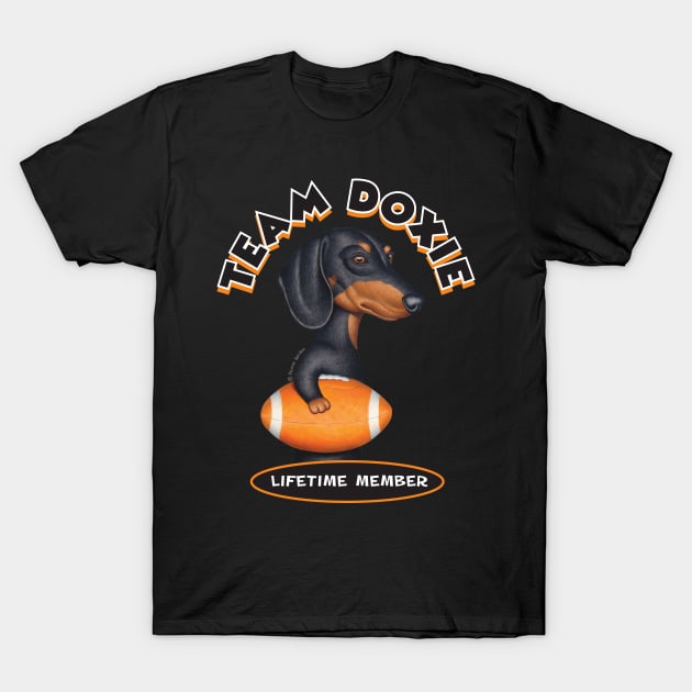 Black Dachshund Holding Orange Football T-Shirt by Danny Gordon Art